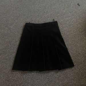 Black velvet pleated skirt